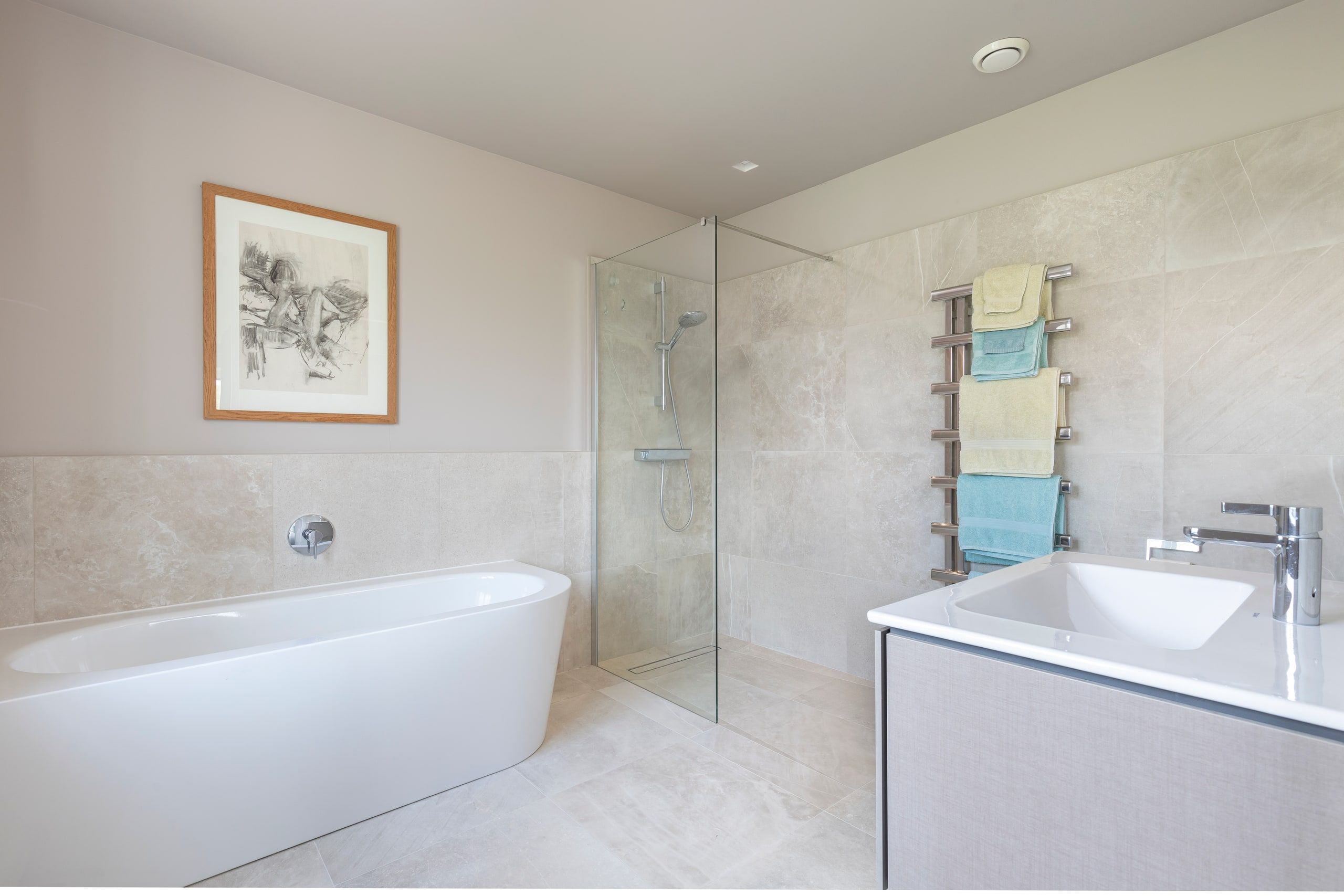 Freestanding bath and walk-in shower in the enlarged en-suite, detached house, Shackleford.